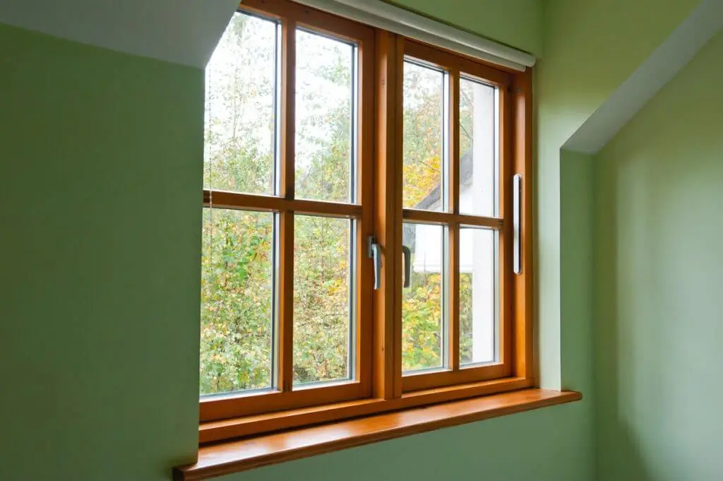 Certified double glazing hamilton contractors working on a Hamilton home to enhance energy efficiency and indoor comfort.