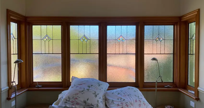 Double glazing hamilton contractors installing energy-efficient windows in a modern Hamilton home for better insulation and comfort.