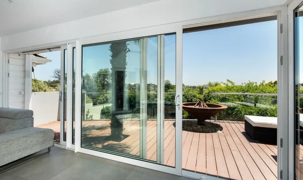 Professionally installed sliding glass doors providing seamless indoor outdoor living with Windows and Doors Hamilton by Double Glazing Hamilton.